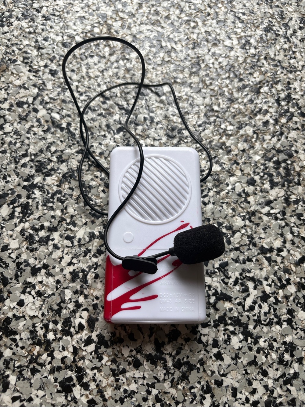 White Portable Voice Amplifier with Red Accent and Black Headset